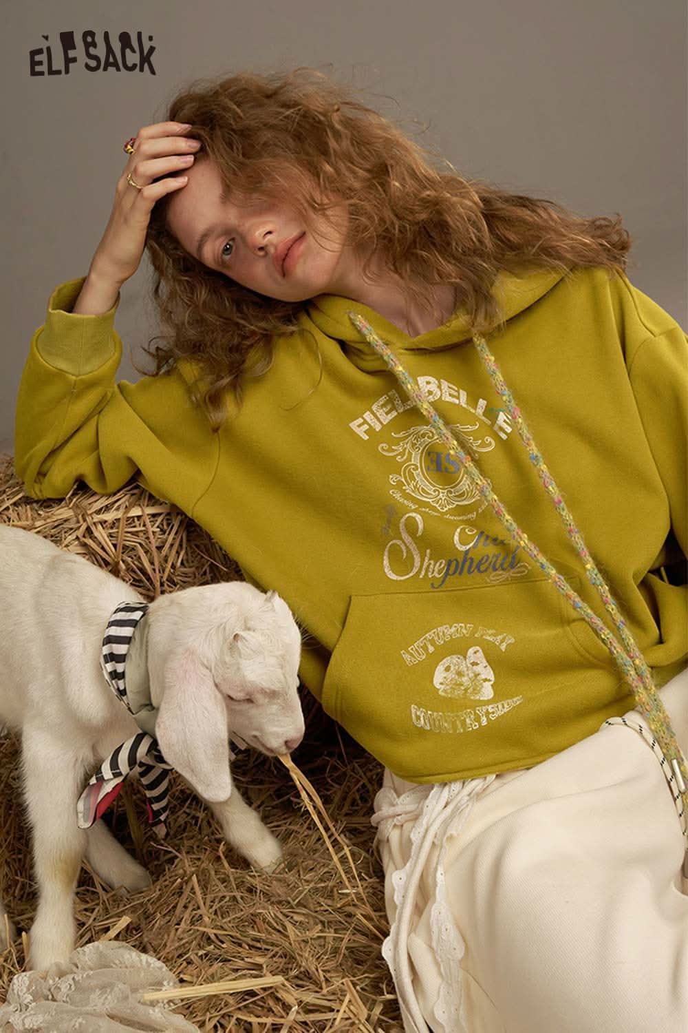 ELFSACK women's oversized print hoodie in olive green with a cozy design and stylish graphics