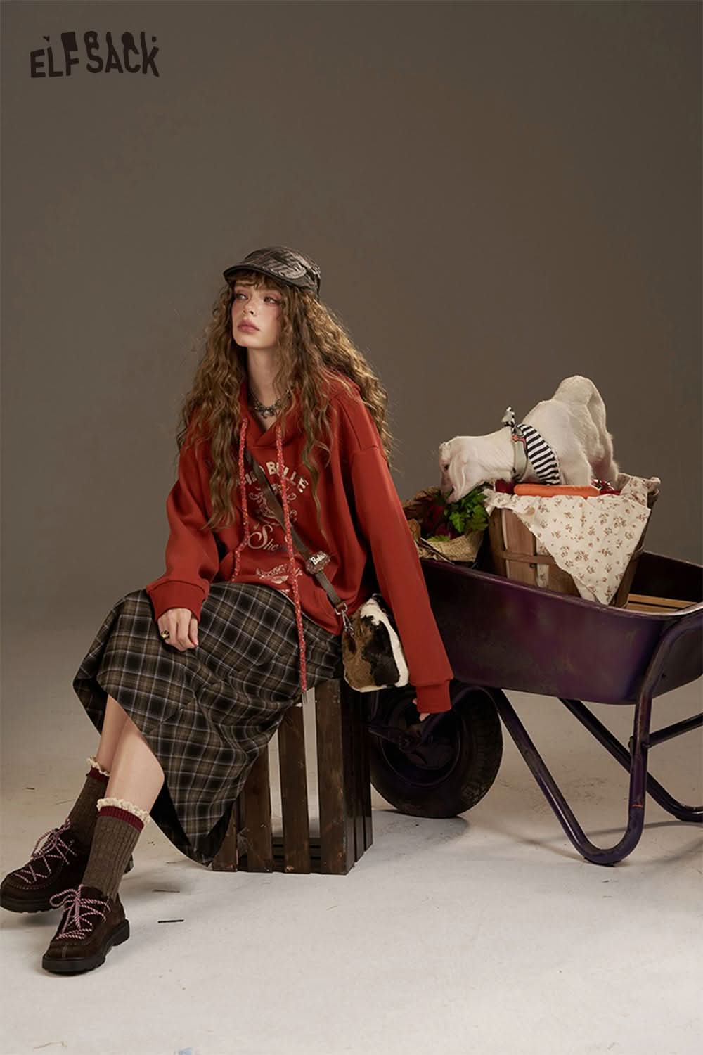 ELFSACK women's oversized print hoodie in red paired with a plaid skirt for a trendy look