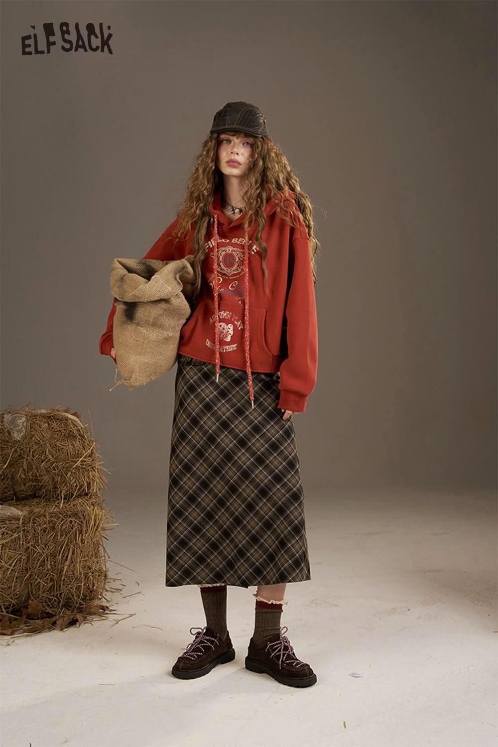 ELFSACK women's oversized print hoodie in red, styled with a long plaid skirt for a trendy look