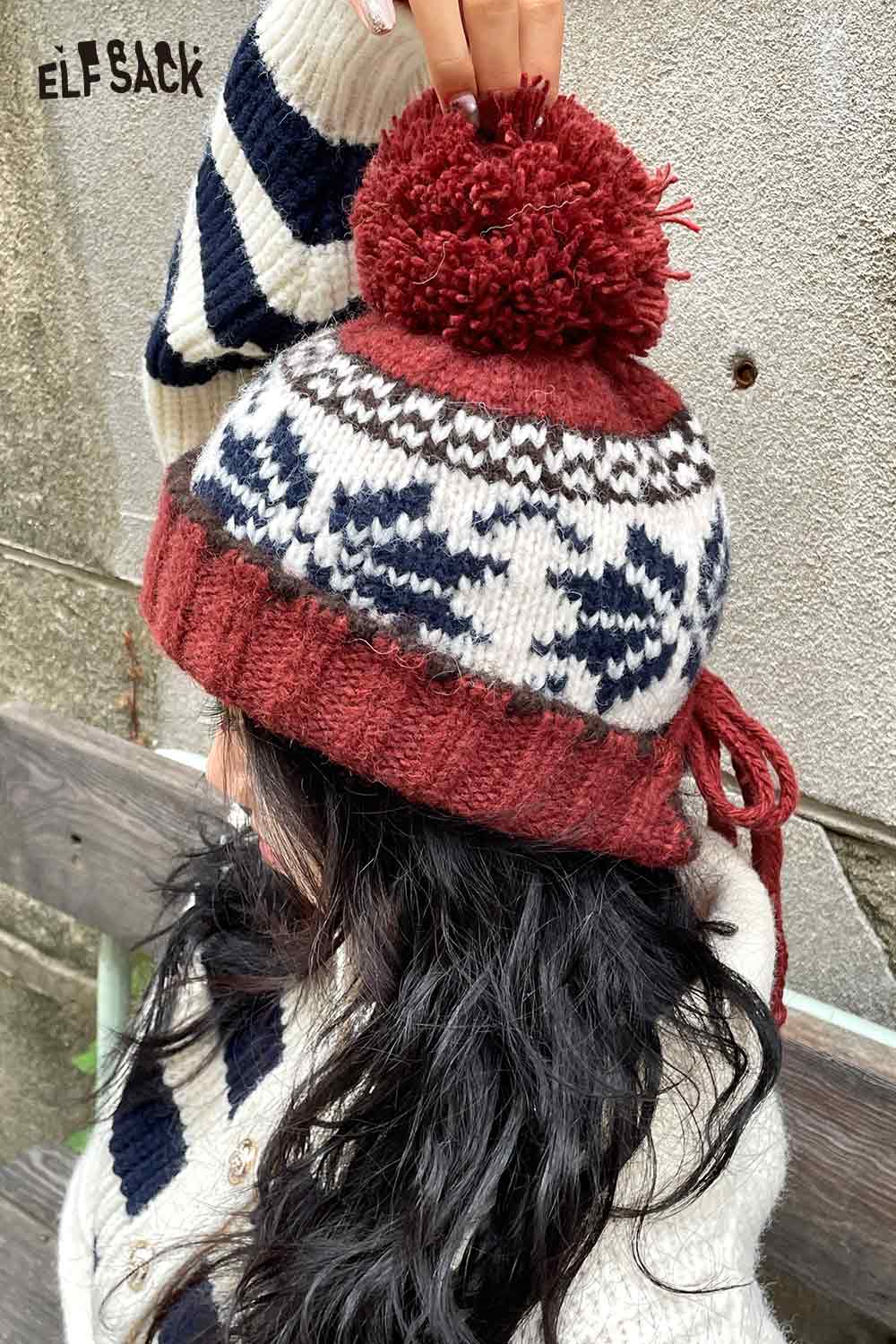 ELFSACK women's patchwork knit hat in maroon with a pom pom and winter patterns