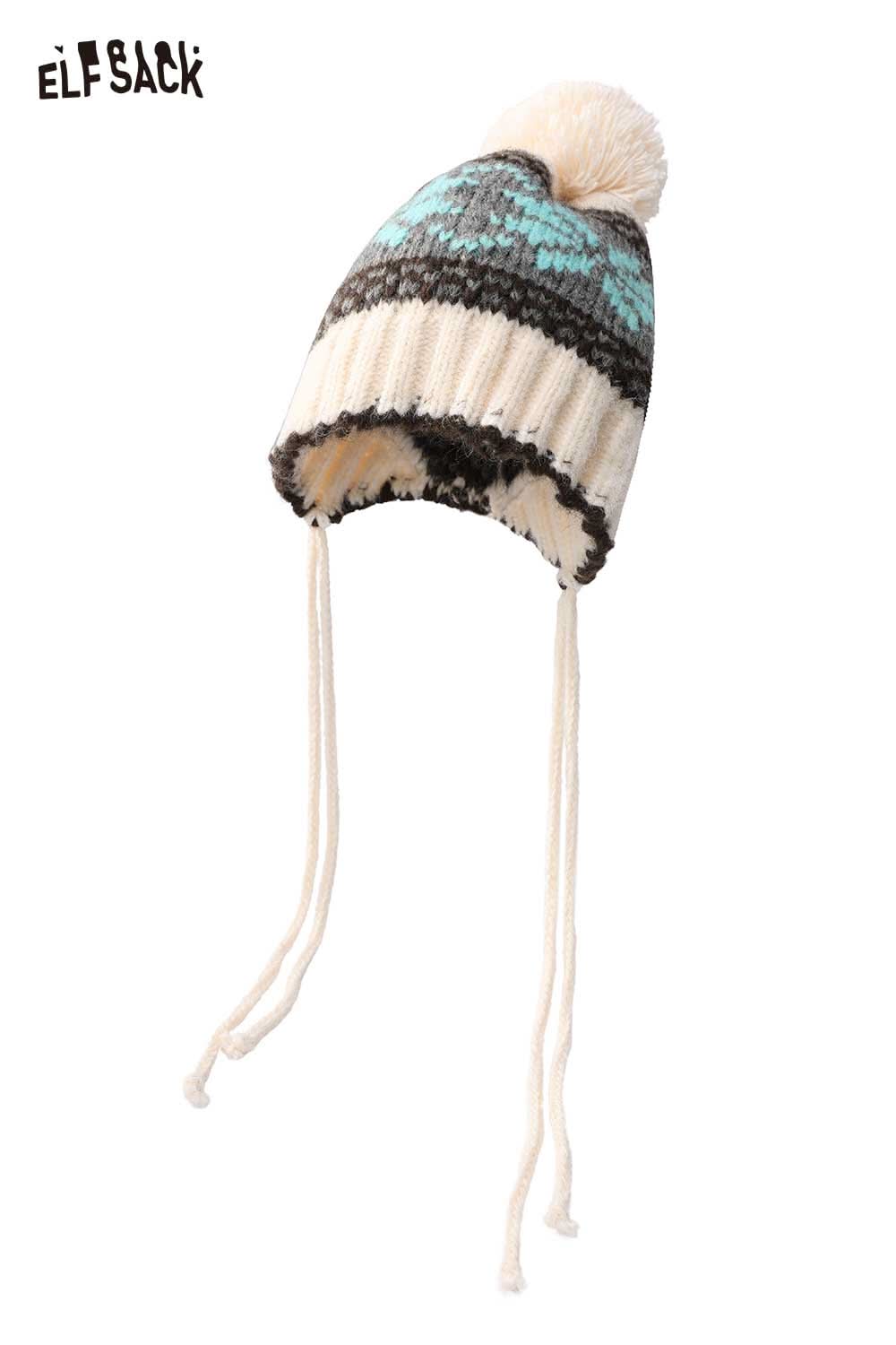 ELFSACK women's patchwork knit hat with a pom pom and ear flaps for warmth and style