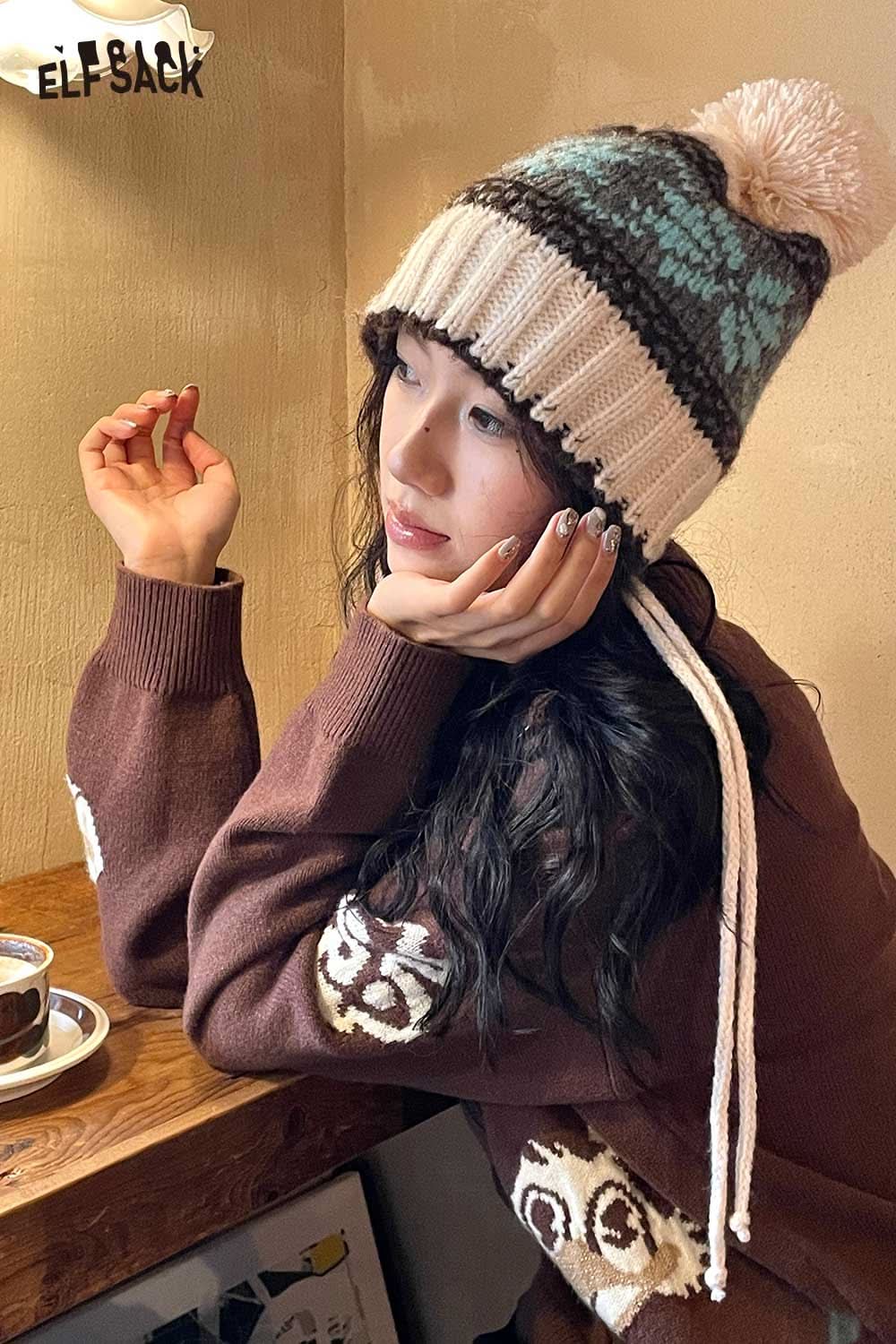 ELFSACK women's patchwork knit hat with a playful pom-pom, perfect for cozy winter looks