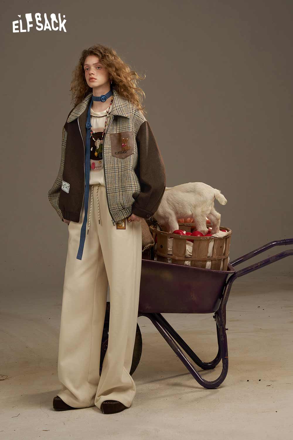 ELFSACK women's patchwork plaid coat styled with a chic outfit and a wheelbarrow backdrop
