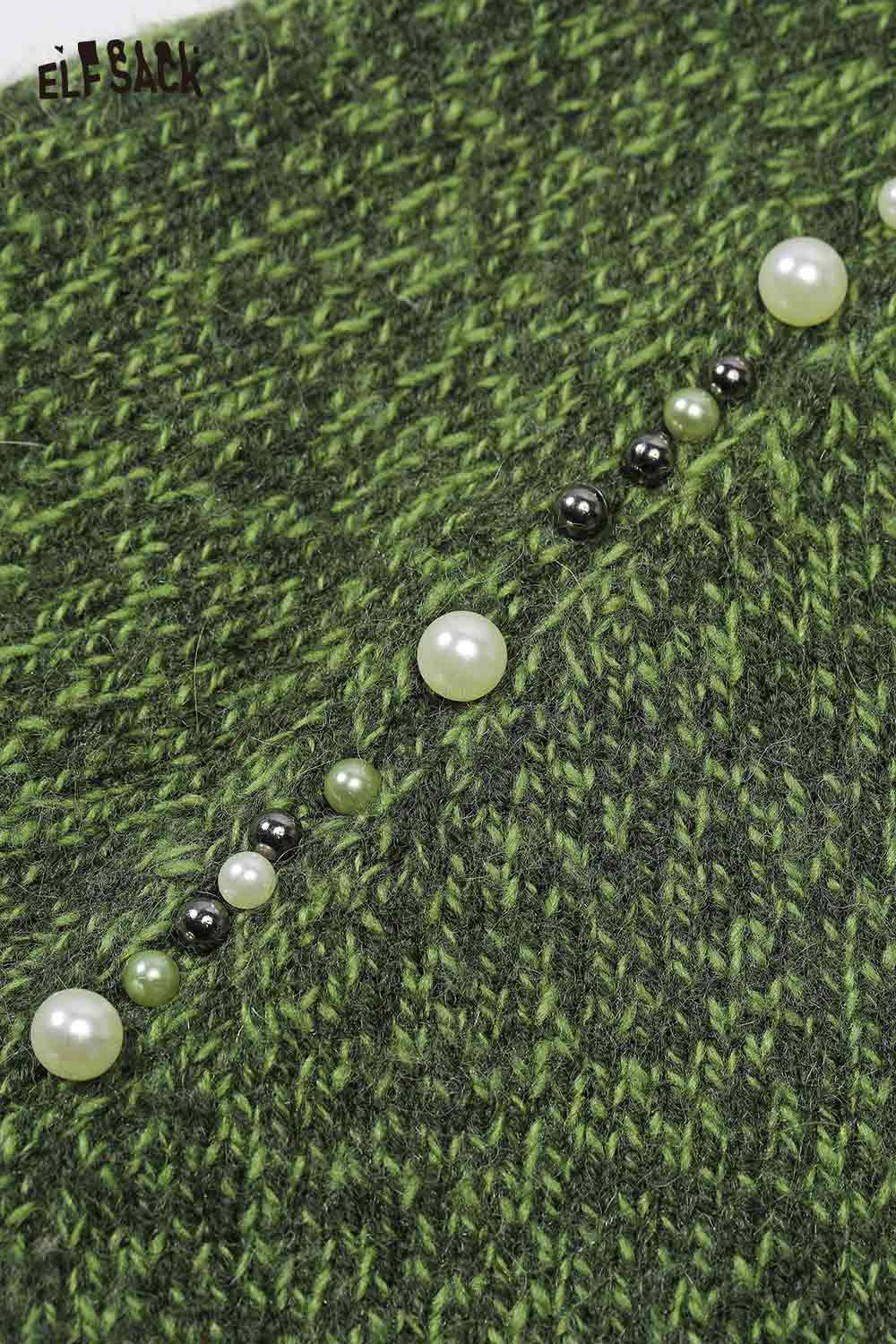Close-up of ELFSACK women's pearl embellished sweater with green knit fabric and decorative pearls