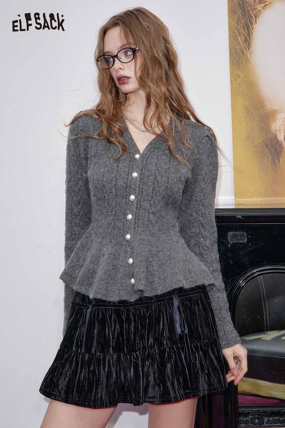 ELFSACK women's peplum knit sweater in gray with button details, paired with a black velvet skirt