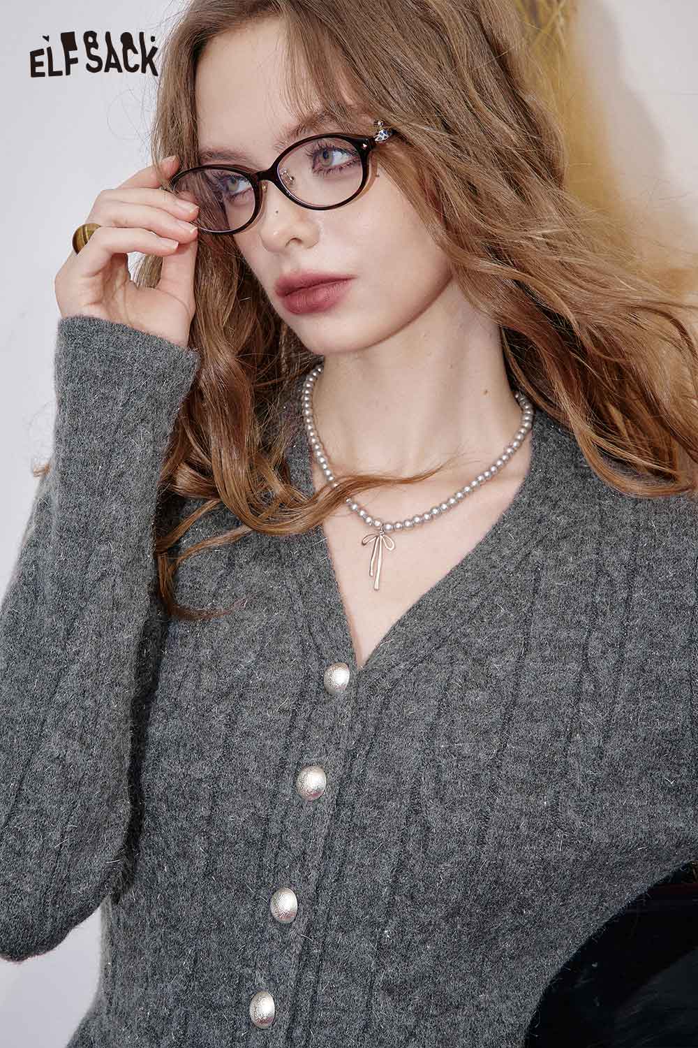 ELFSACK women's peplum knit sweater in gray with button details and a stylish v-neckline