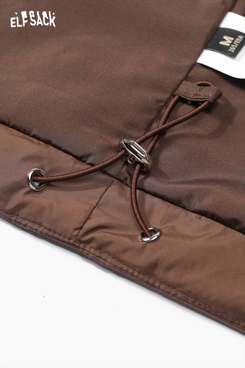 Close-up of ELFSACK women's plaid down jacket detailing with adjustable drawstring and fabric texture