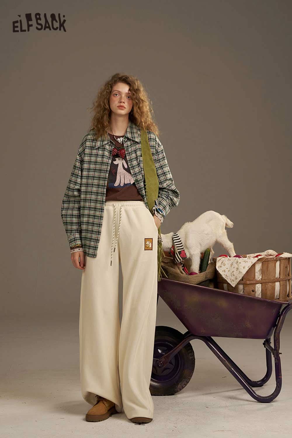 ELFSACK women's plaid shirt with back print styled with wide-leg pants for a casual look