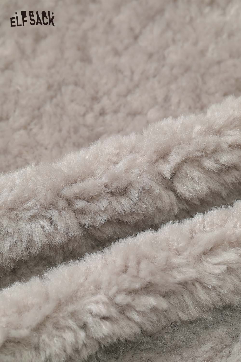 Close-up of soft fabric showcasing women's plush lapel short coat by ELFSACK in a neutral color