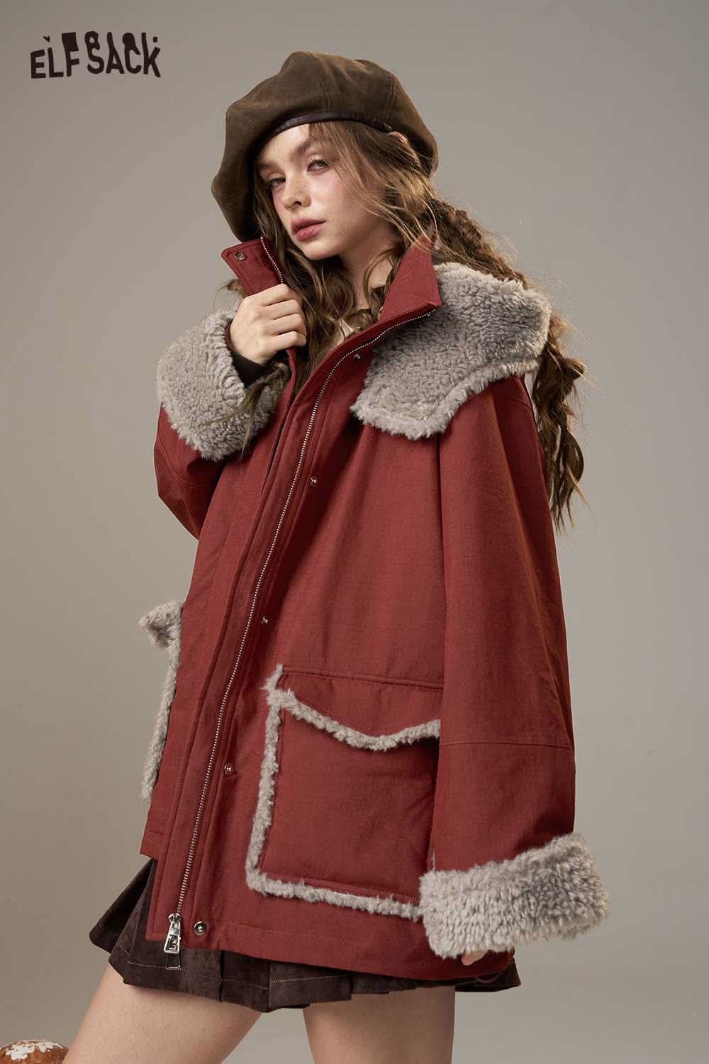 ELFSACK women's plush puffer jacket with cozy fur trim and oversized pockets in warm colors