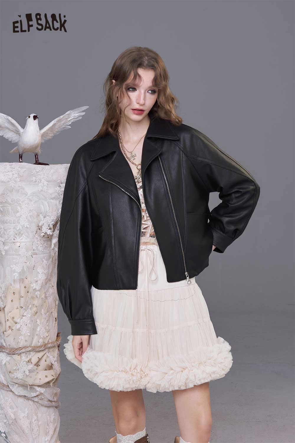 ELFSACK women's PU motorcycle jacket in black, paired with a stylish white skirt for a trendy look