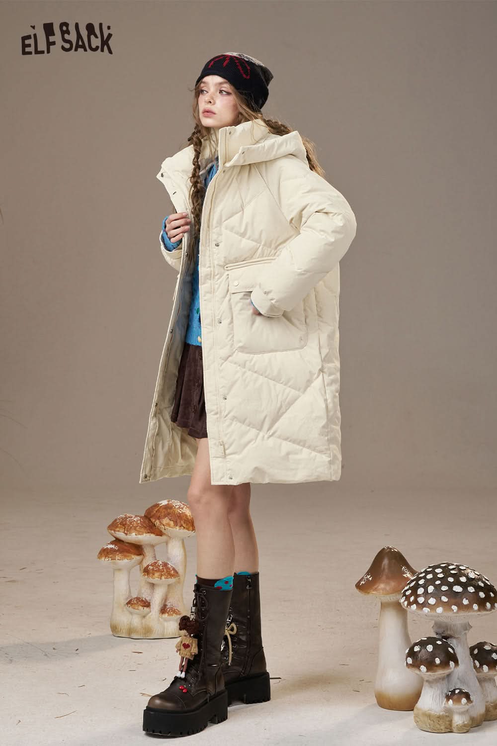 ELFSACK women's quilted puffer jacket in cream with hood, styled with a playful look by mushrooms