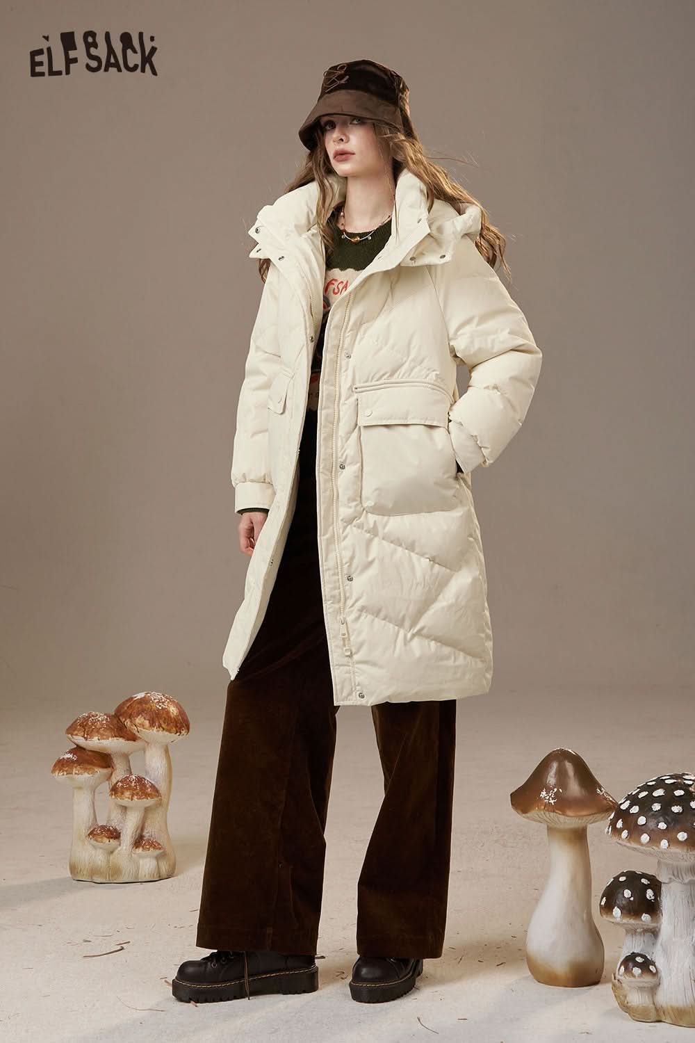 ELFSACK women's quilted puffer jacket in cream color, styled with wide-leg pants and a hat