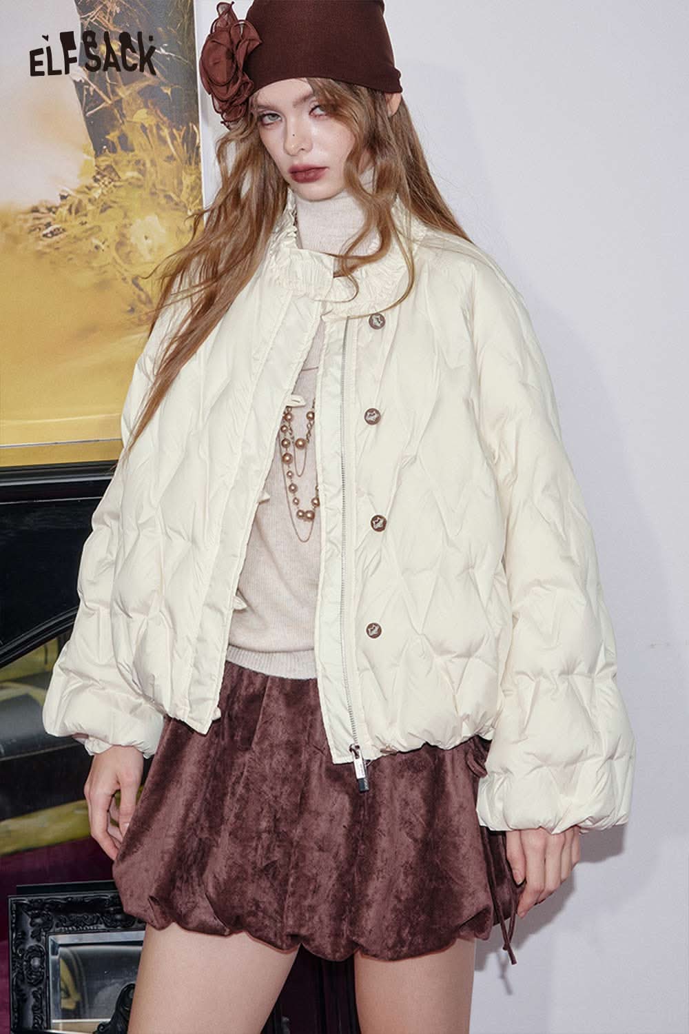 ELFSACK women's quilted puffer jacket in cream color, featuring a stylish design and comfortable fit
