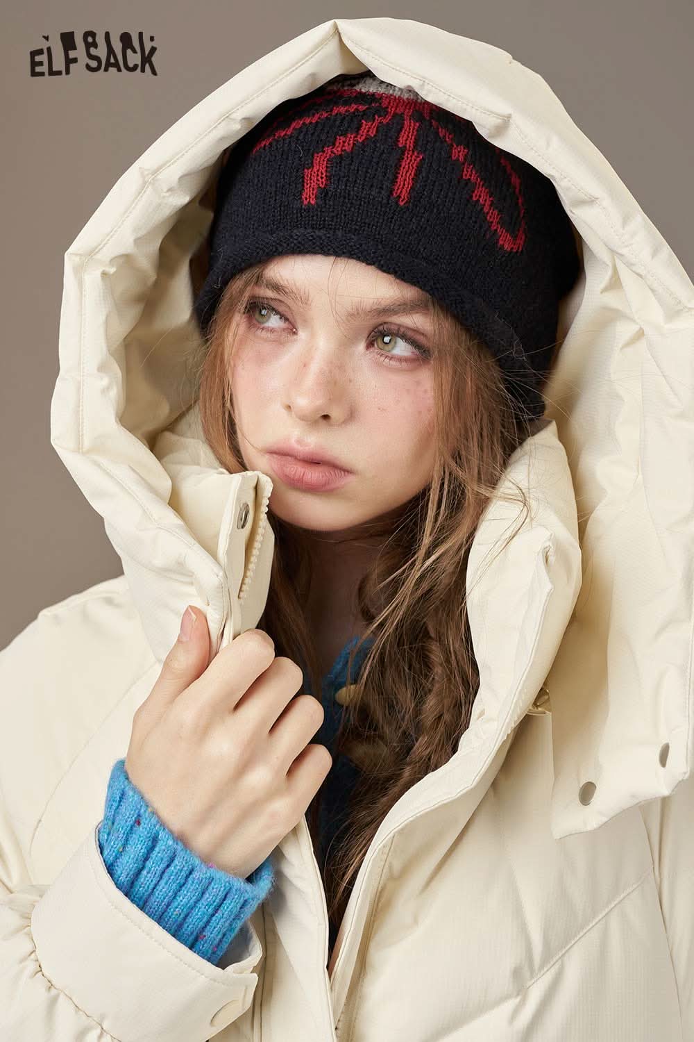 ELFSACK women's quilted puffer jacket in cream color with cozy hood for warmth and style