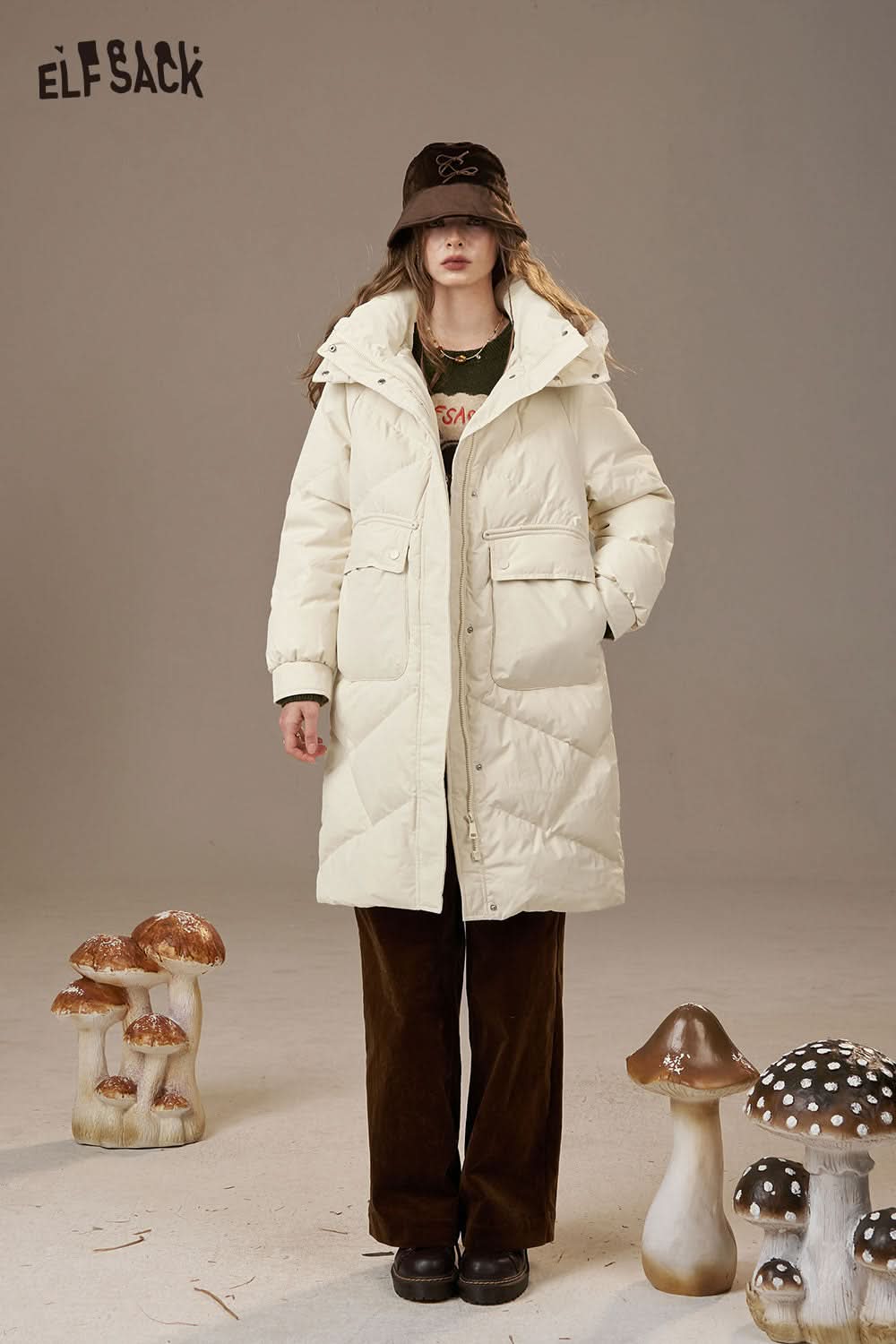 ELFSACK women's quilted puffer jacket in cream color with large pockets and a cozy hood