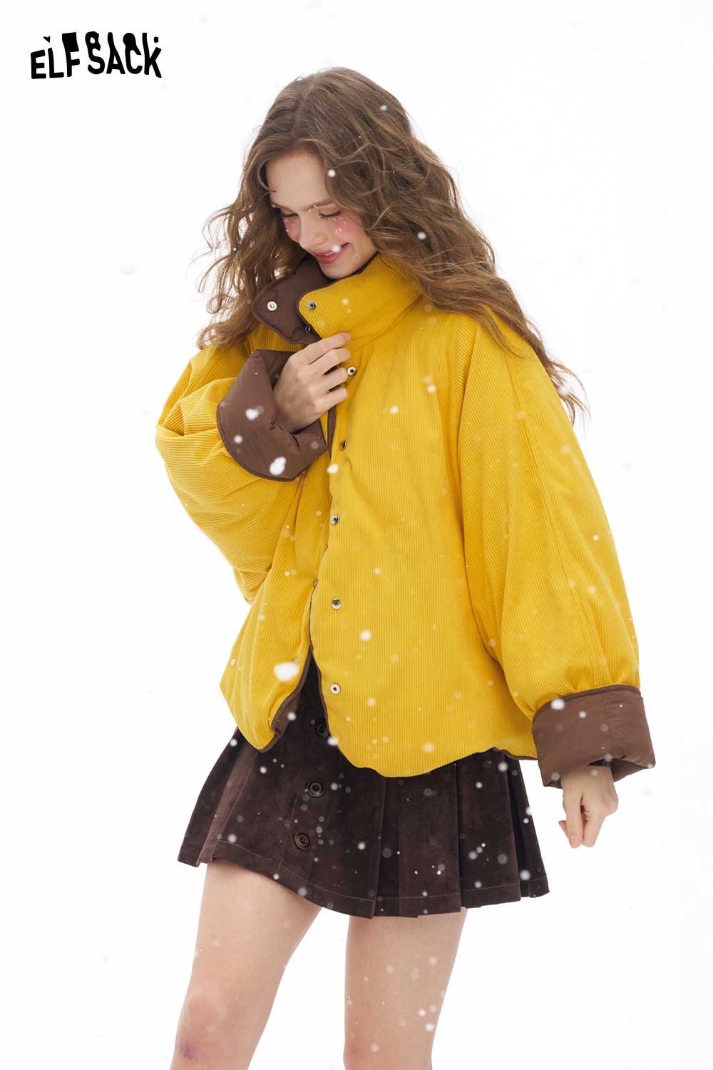 ELFSACK women's reversible down jacket in yellow with brown accents, perfect for cold weather