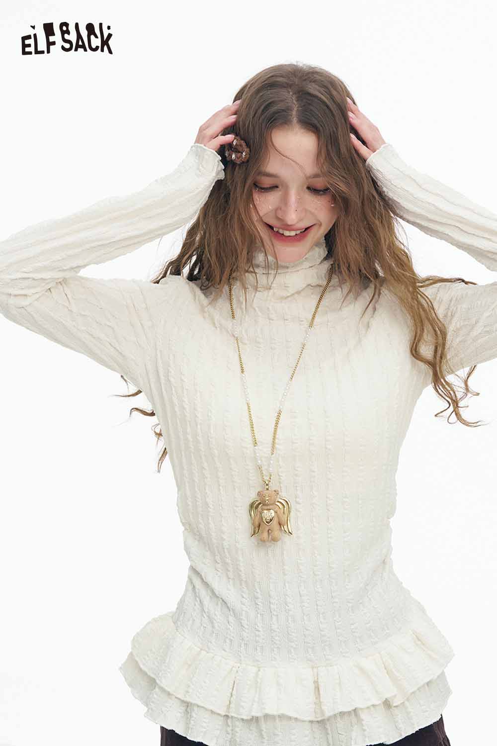 ELFSACK women's ruffle high neck t-shirt in cream with textured fabric and playful hemline