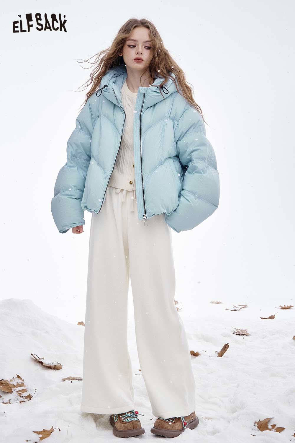 ELFSACK women's short down jacket in light blue, styled with a cream outfit for winter fashion