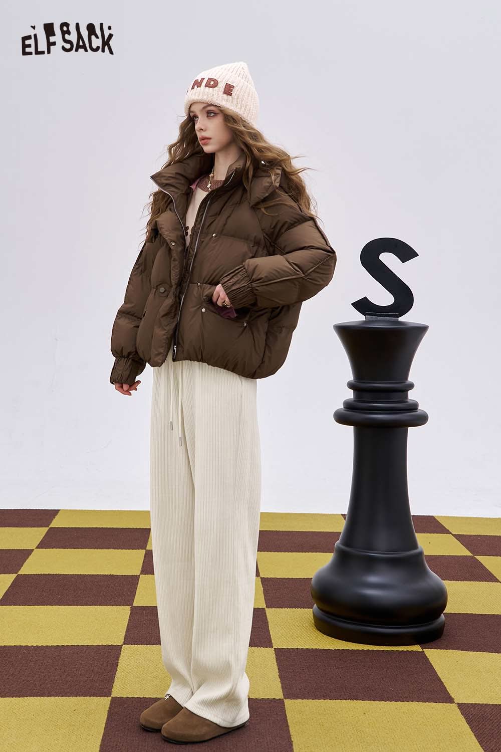 ELFSACK women's slim fit elastic drawstring pants in cream paired with a stylish brown puffer jacket