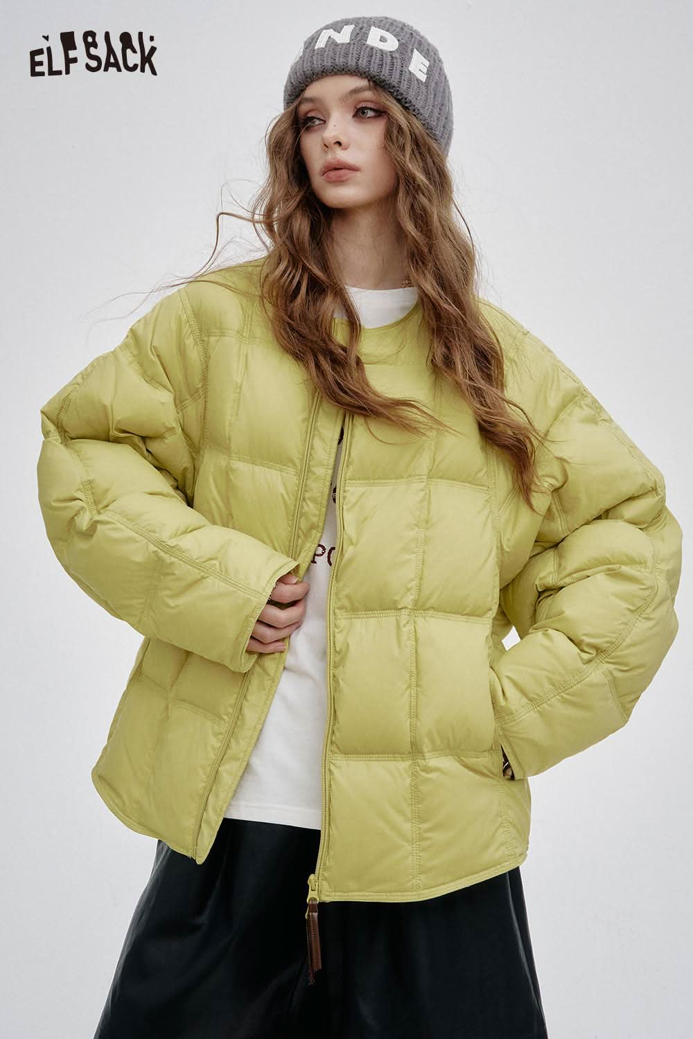 ELFSACK women's soft down jacket in bright yellow with a relaxed fit and zip closure