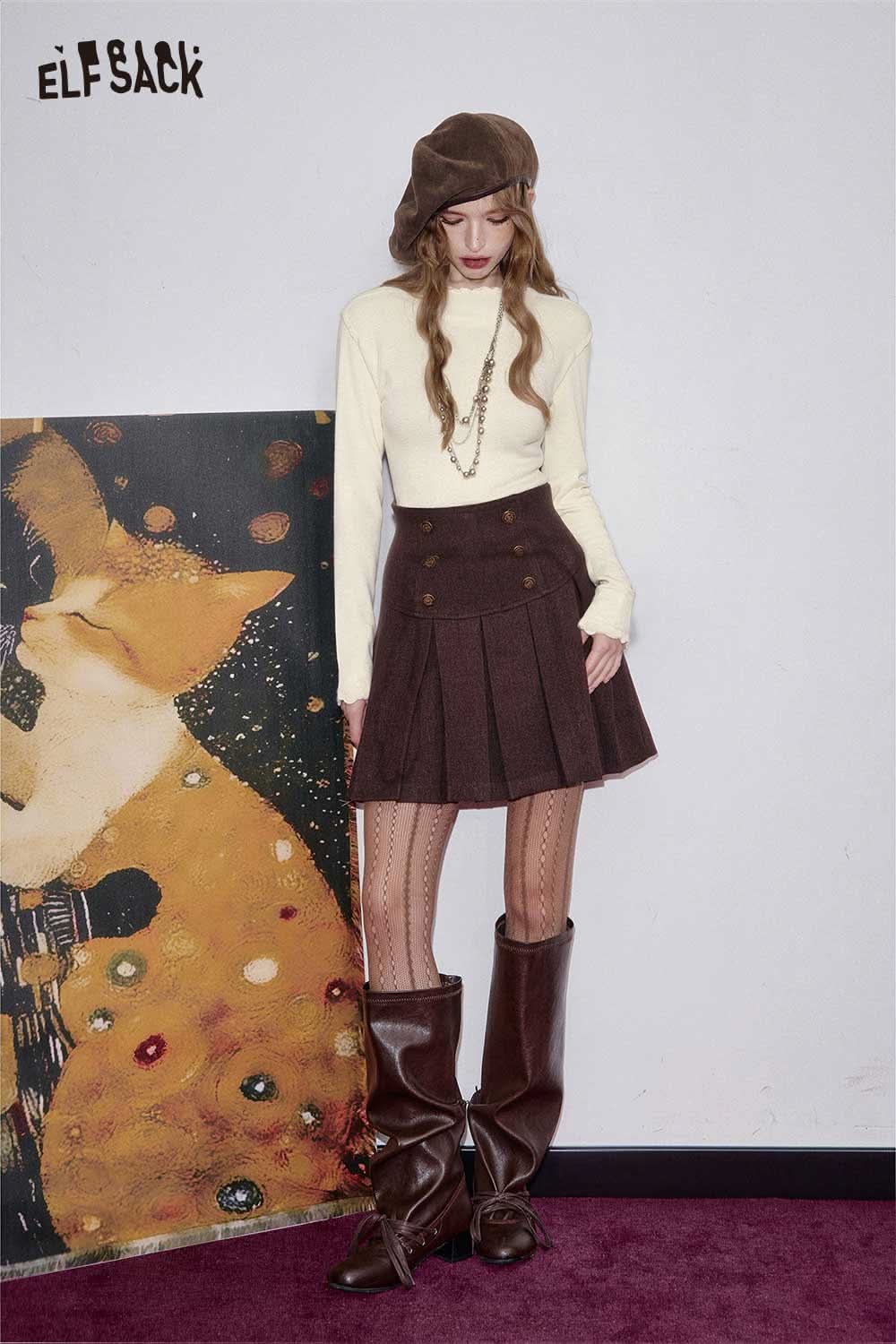 Model wearing an ELFSACK women's soft fitted long sleeve top with a brown skirt for a stylish look