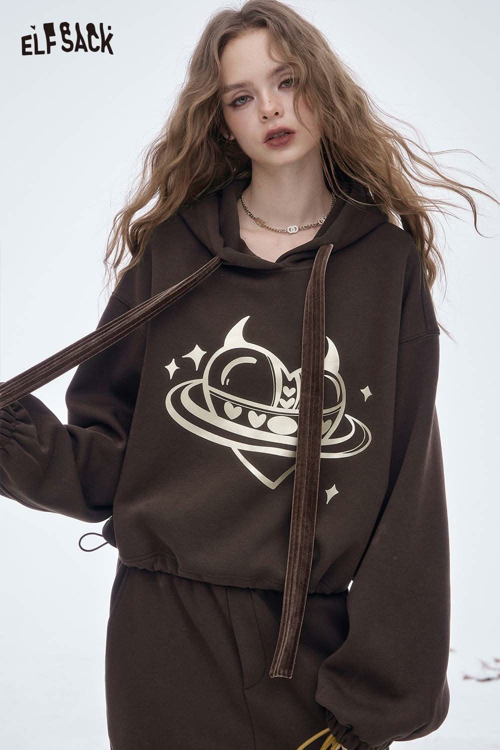 ELFSACK women's soft heart graphic skirt set featuring a cozy hoodie and matching skirt in brown