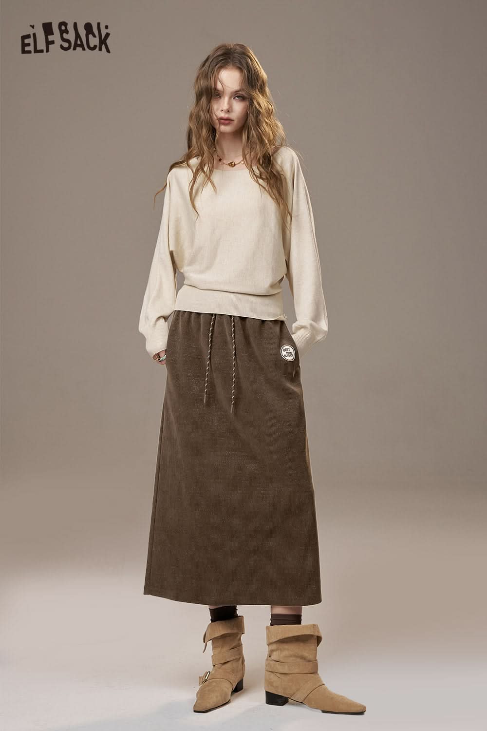 ELFSACK women's soft textured midi skirt in brown featuring a comfortable drawstring waist