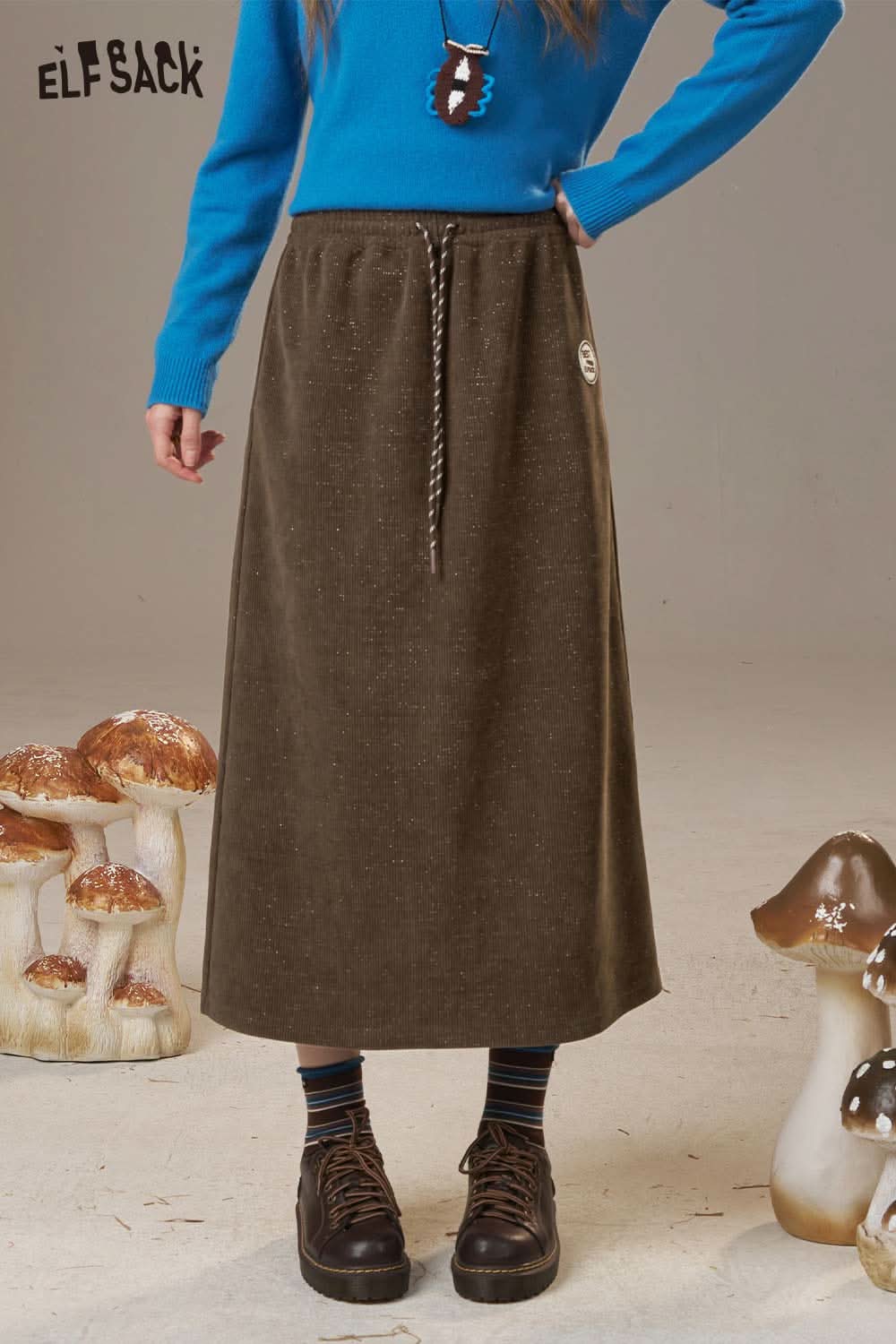 ELFSACK women's soft textured midi skirt in olive green with drawstring waist and relaxed fit