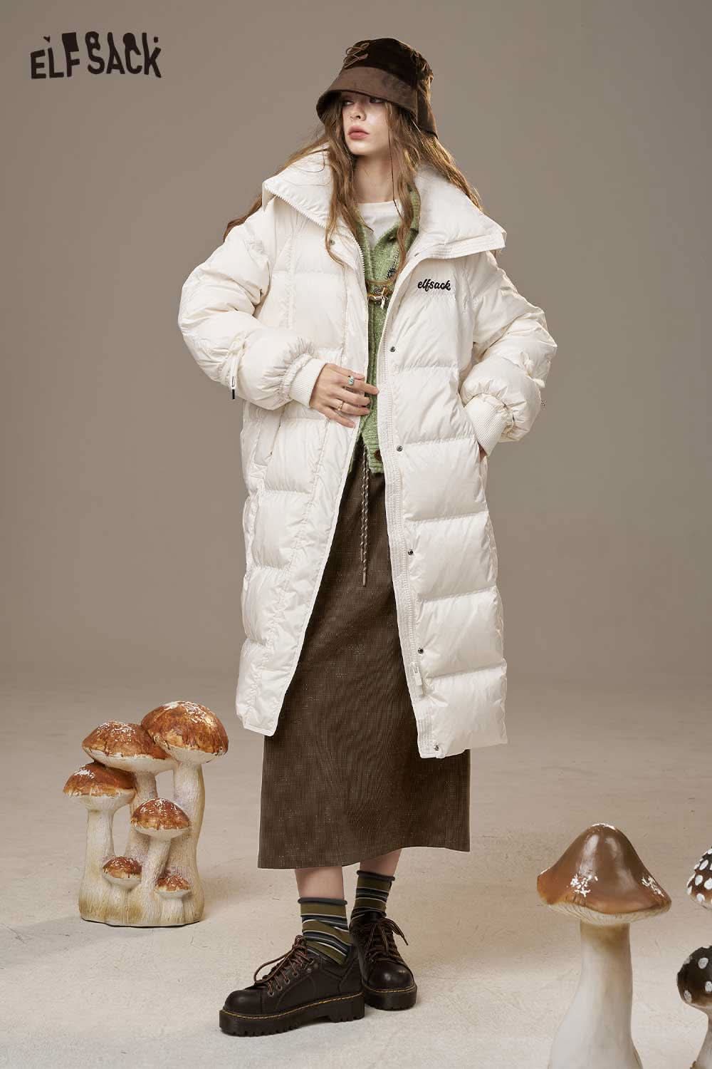 ELFSACK women's soft textured midi skirt paired with a stylish puffer coat and a trendy bucket hat