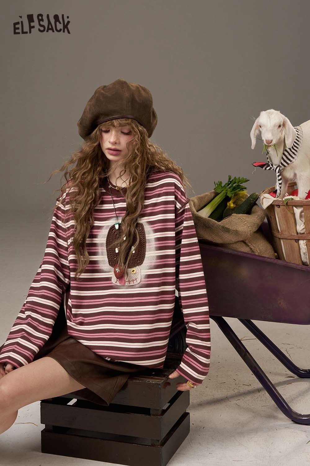 ELFSACK women's soft yarn sweatshirt with striped design and playful animal print for casual style