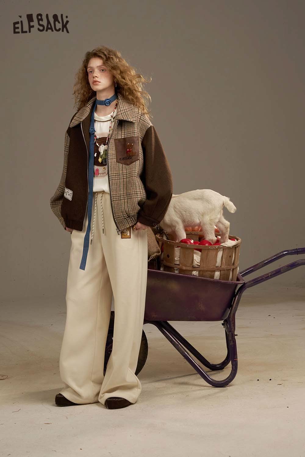 ELFSACK women's soft yarn sweatshirt styled with wide-leg pants and a chic layered look
