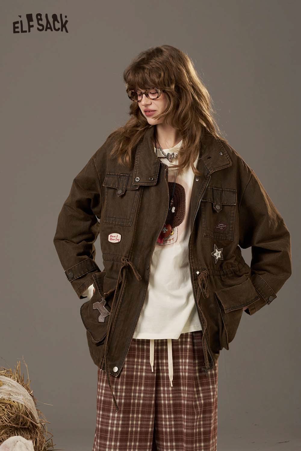 ELFSACK women's soft yarn sweatshirt styled with a brown jacket and plaid pants for a trendy look