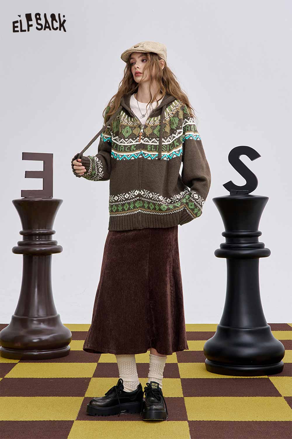 ELFSACK women's soft zip hooded sweater in brown with colorful geometric patterns, styled with a skirt
