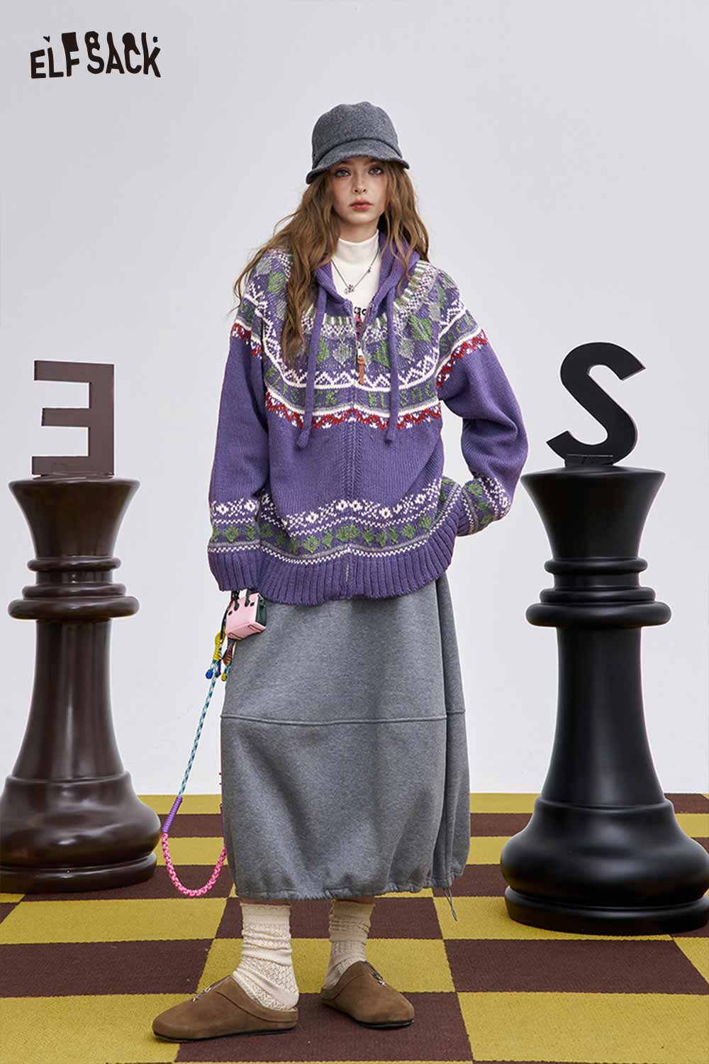 ELFSACK women's soft zip hooded sweater in purple with colorful patterns, styled with a long gray skirt
