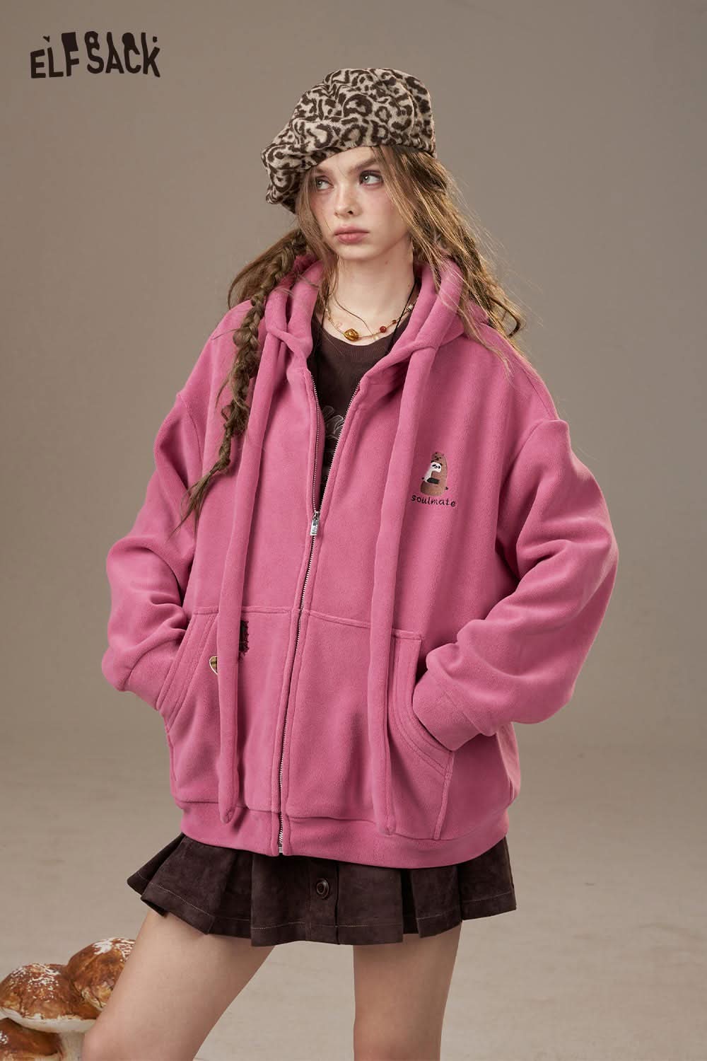 
                  
                    ELFSACK women's soft zip hoodie in pink with front pockets and a relaxed fit for casual wear
                  
                