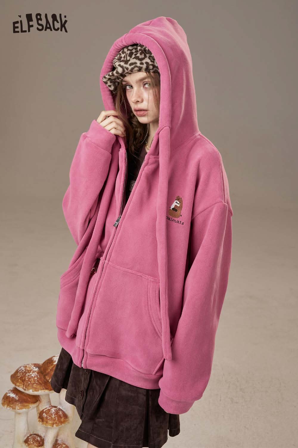 ELFSACK women's soft zip hoodie in pink with a cozy oversized fit and playful design details