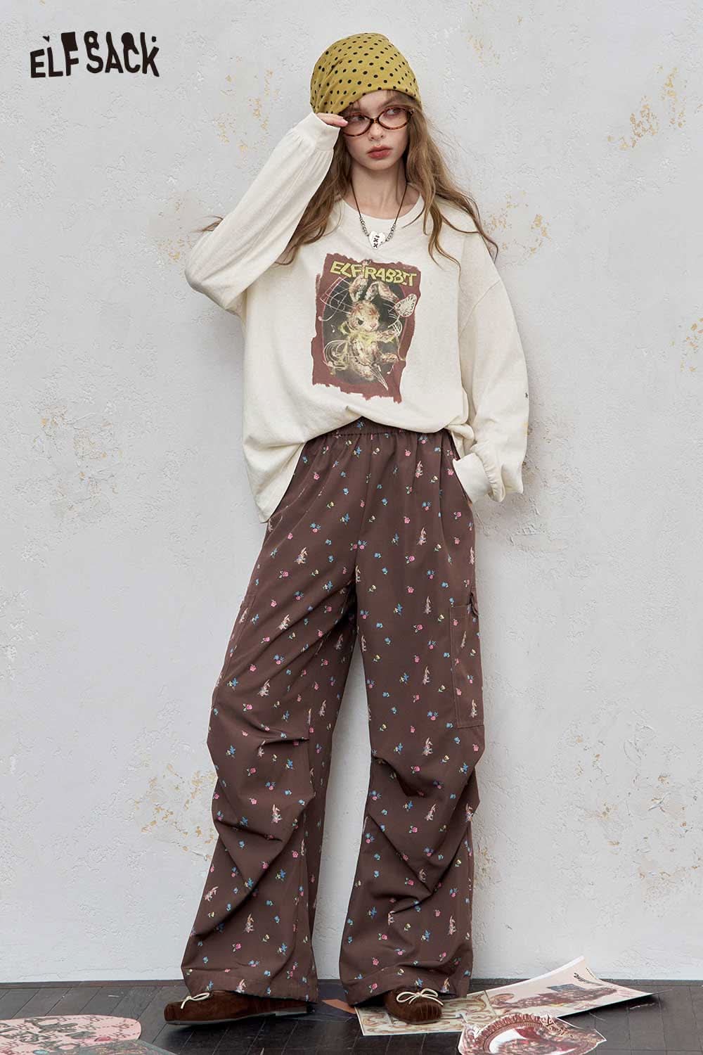 ELFSACK women's star print cotton tee styled with relaxed trousers and accessories for a casual look