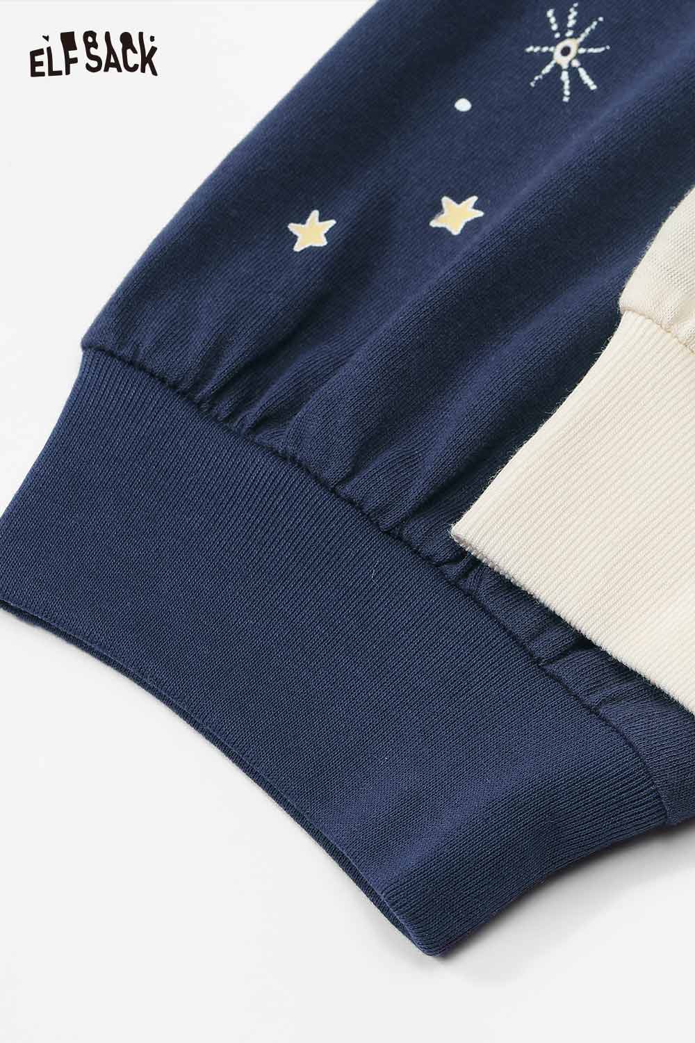 Close-up of ELFSACK women's star print cotton tee sleeve with elastic cuff detail