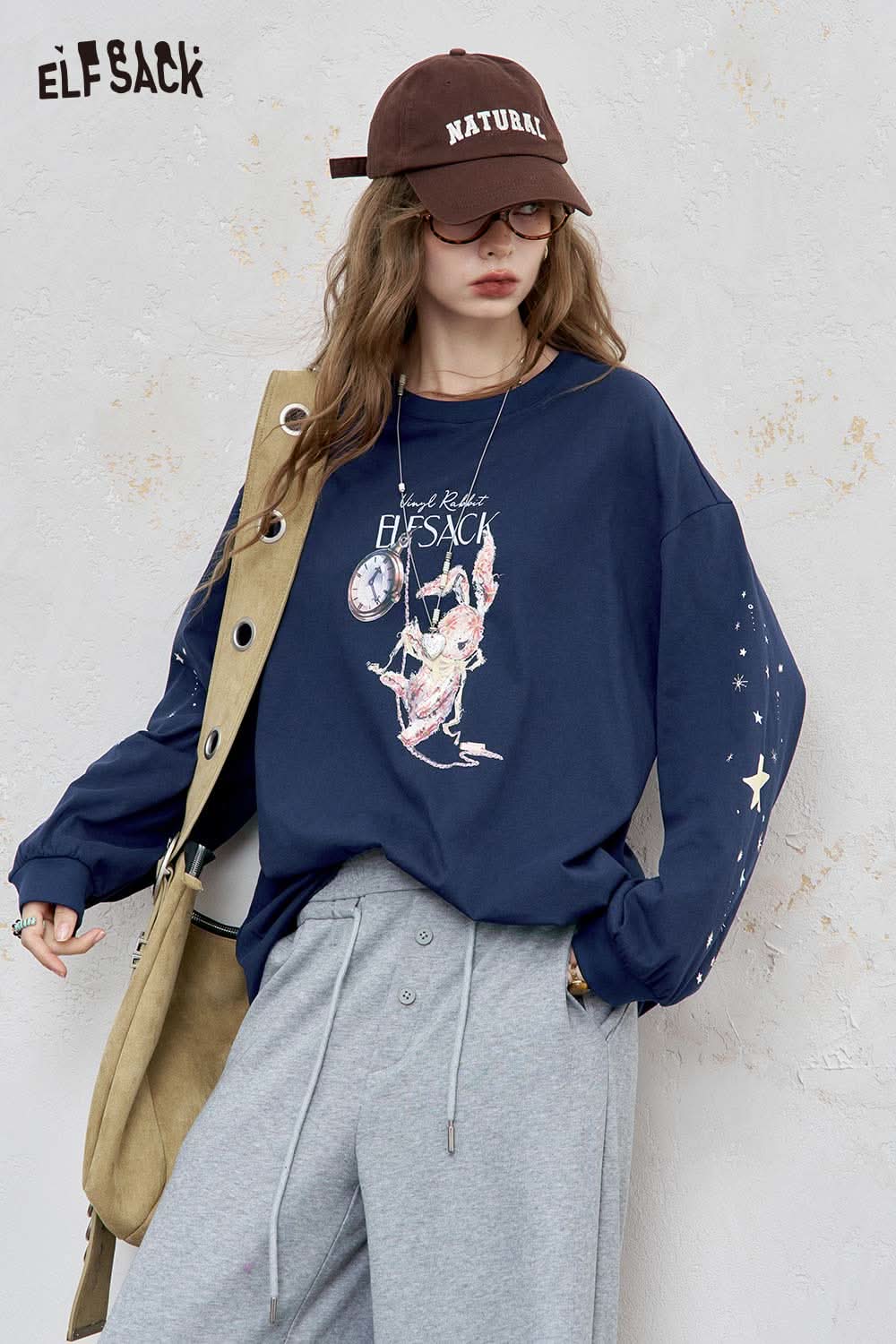ELFSACK women's star print cotton tee in navy blue with graphic design and star accents on sleeves