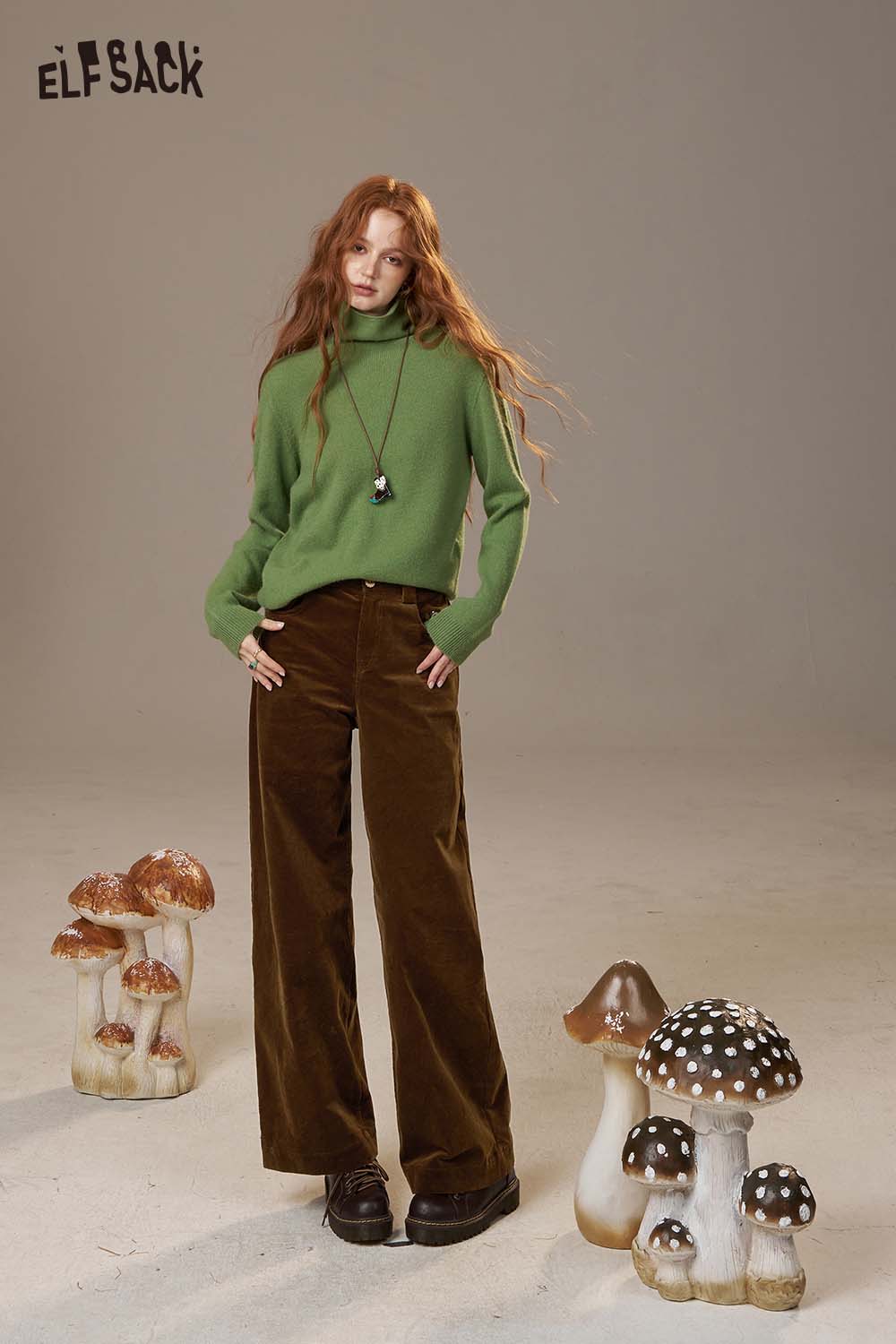 Model wearing ELFSACK women's straight leg cotton blend pants with a green sweater and trendy platform shoes