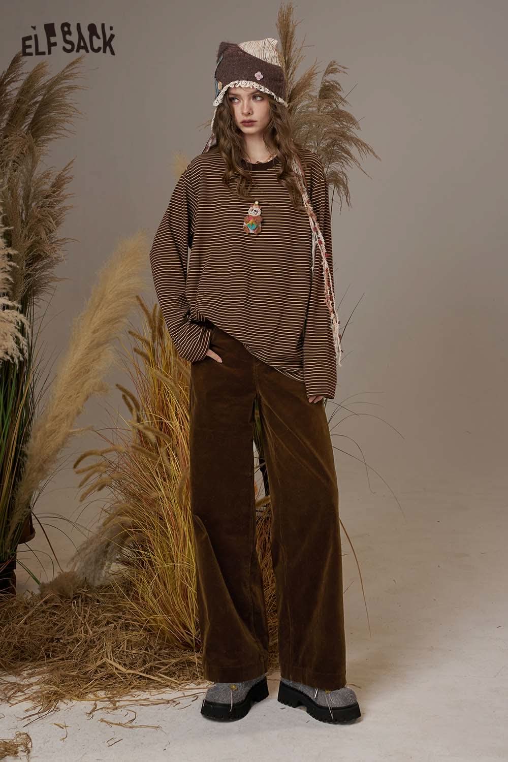 ELFSACK women's straight leg cotton blend pants in brown with a relaxed fit and paired with a striped top