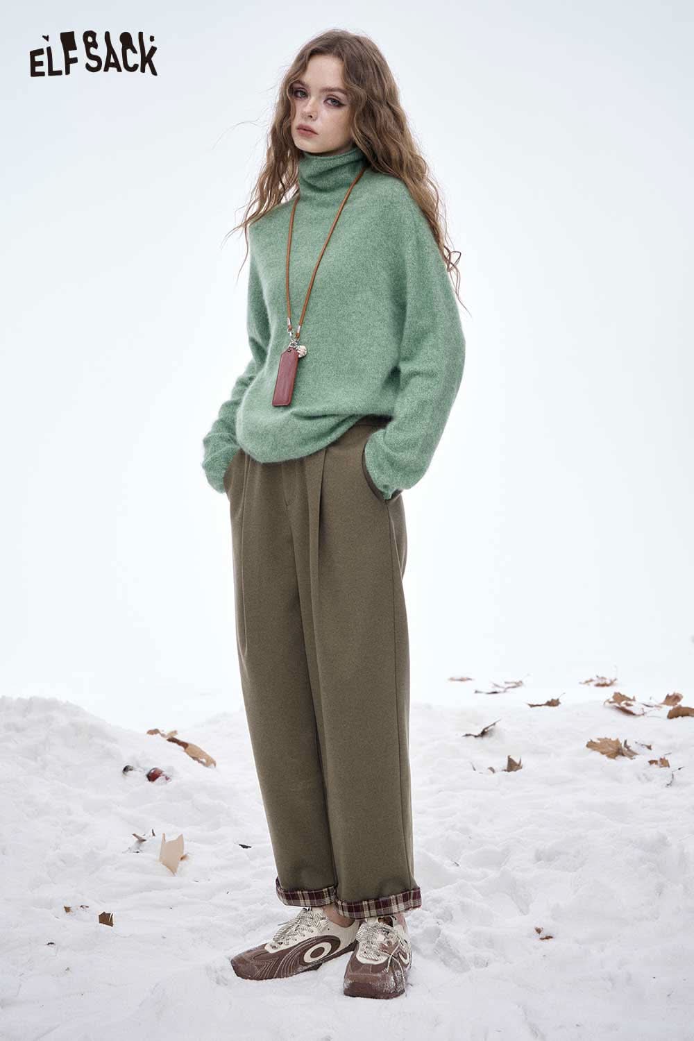 ELFSACK women's striped cuff straight pants styled with a cozy green sweater in a winter setting