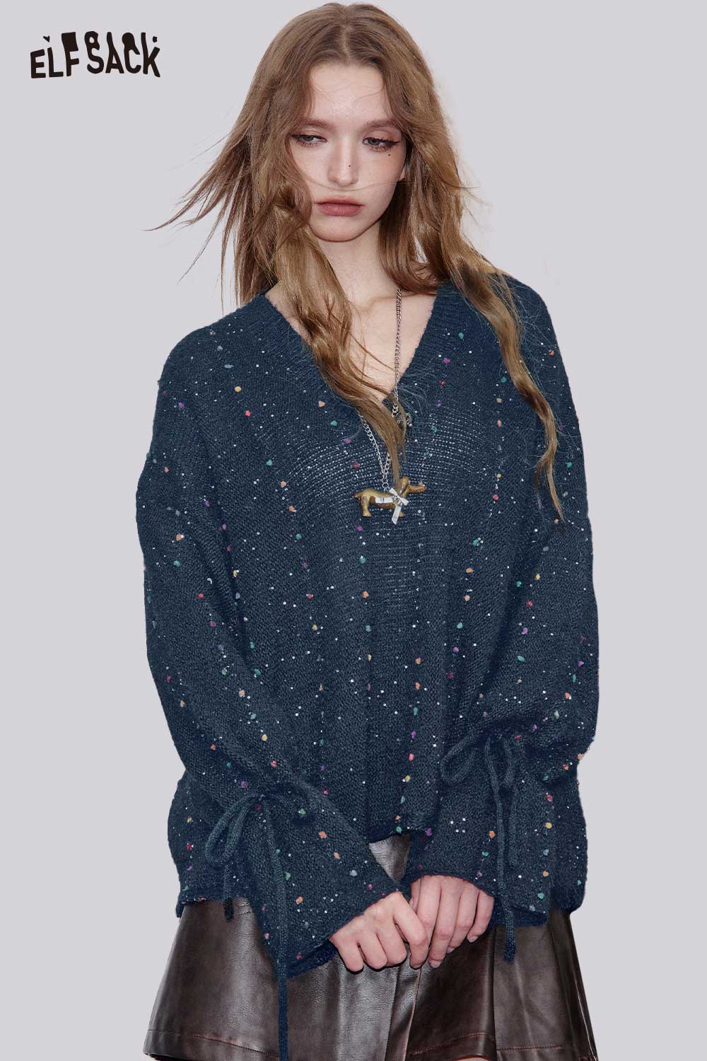 ELFSACK women's v-neck openwork sweater in navy with colorful speckles and tie details on sleeves