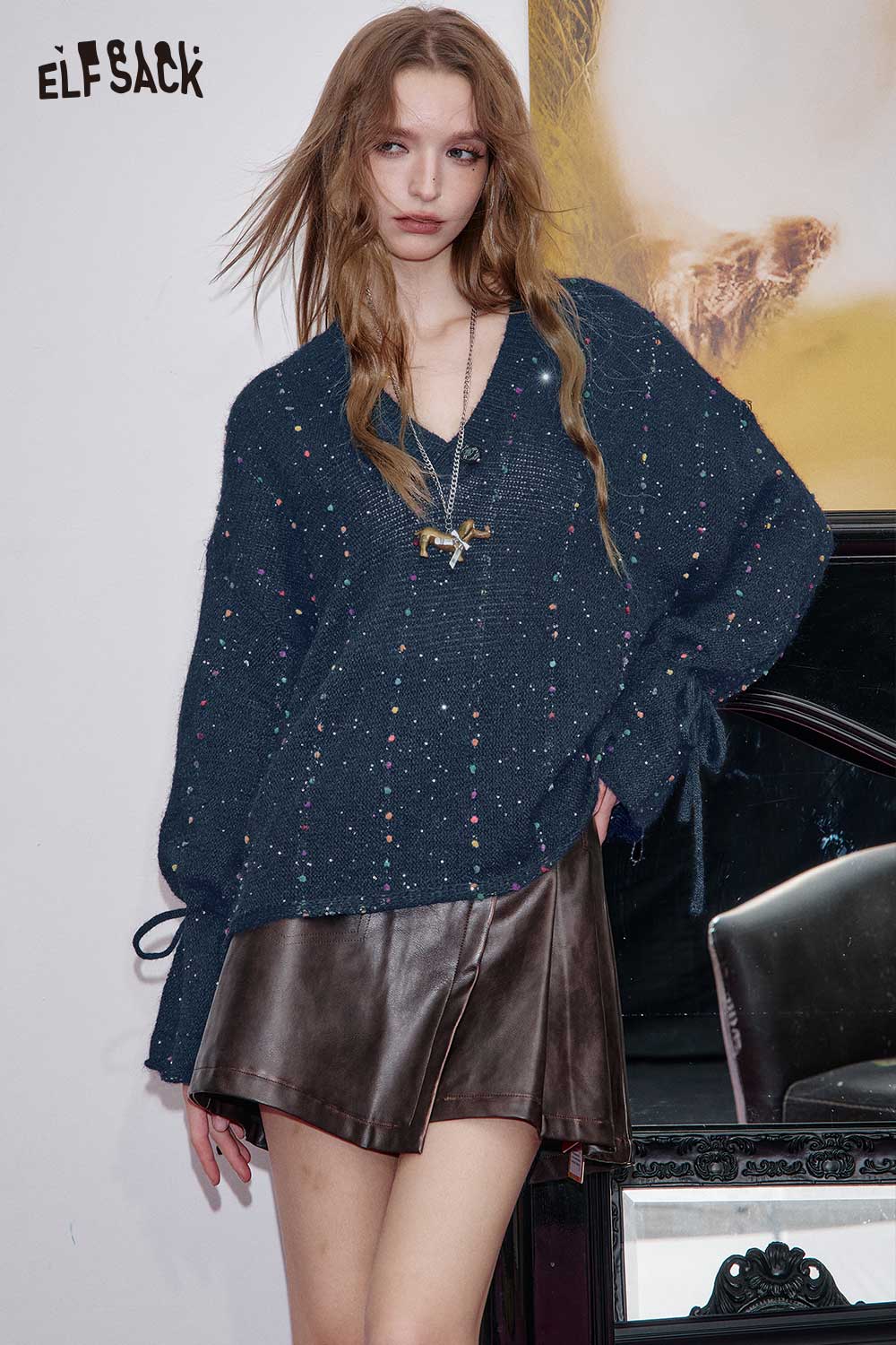 ELFSACK women's v-neck openwork sweater in navy with colorful dots, styled with a brown leather skirt