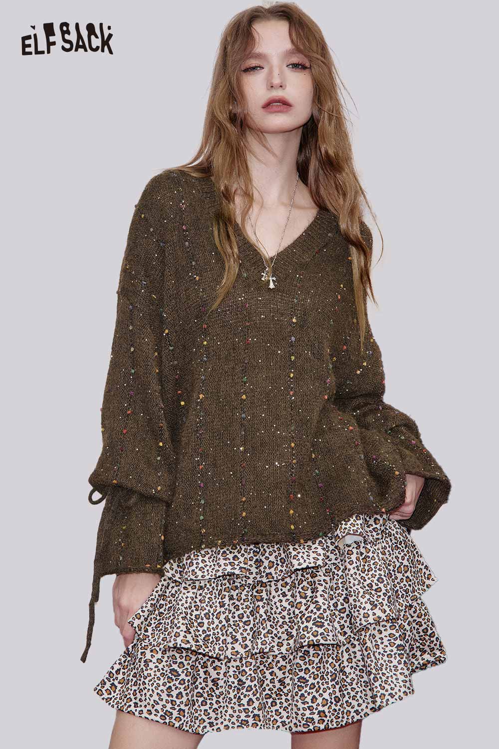 ELFSACK women's v-neck openwork sweater in olive green paired with a stylish ruffled leopard print skirt