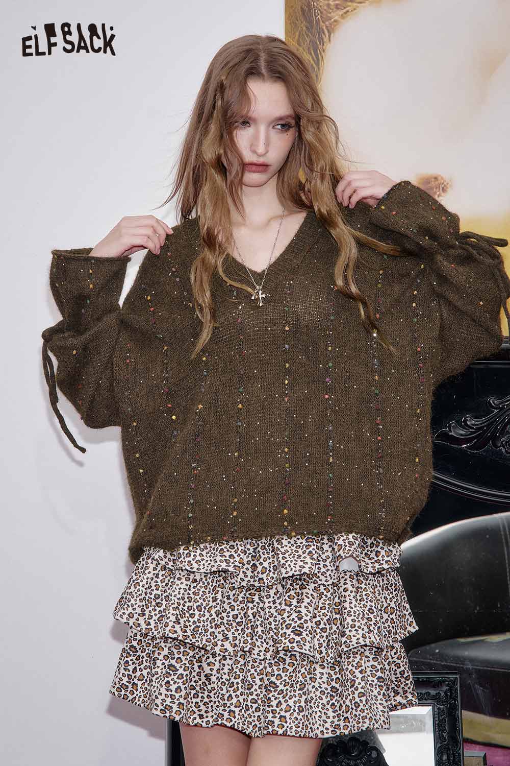 ELFSACK women's v-neck openwork sweater in olive green with colorful specks paired with a stylish leopard print skirt