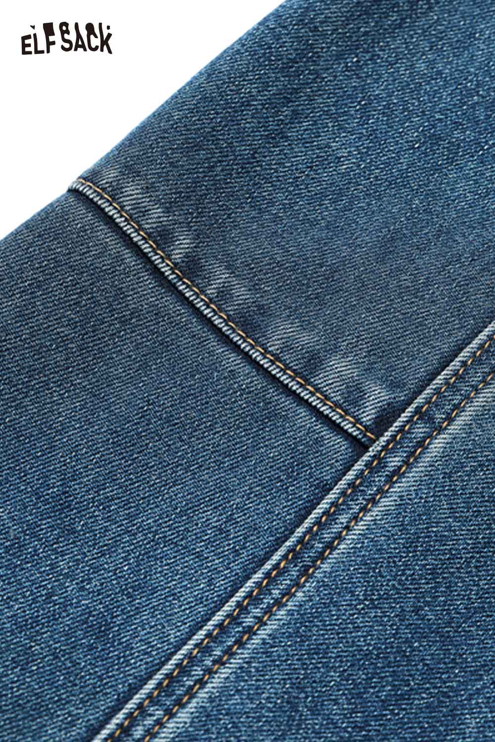 Close-up of ELFSACK women's vintage washed jeans showcasing detailed stitching and fabric texture