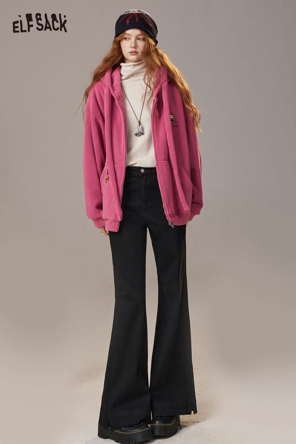 ELFSACK women's wide leg flare jeans in black paired with a pink hoodie for a stylish look