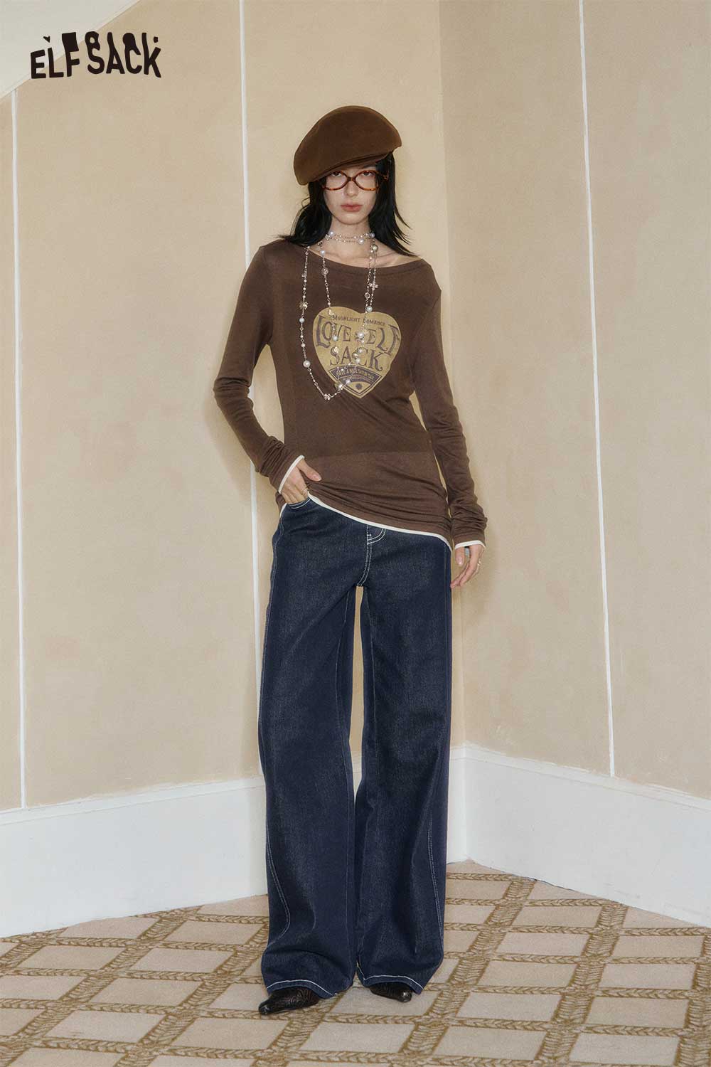 ELFSACK women's wide leg jeans in dark denim paired with a stylish long-sleeve shirt and accessories